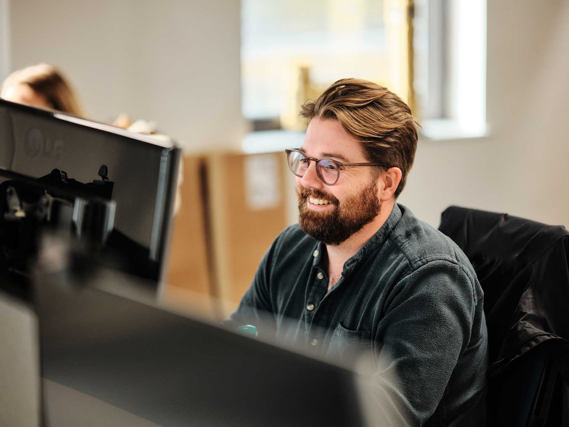 Person reviews the best applicant tracking system